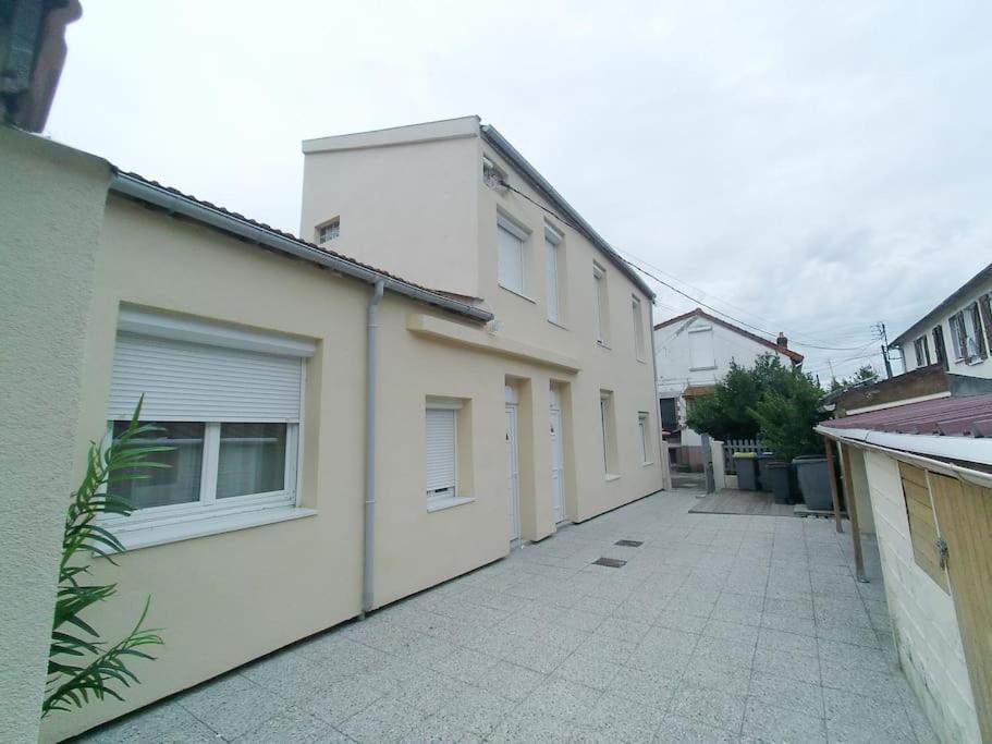 *Douceur Des Tropiques*Parisis Apartment Argenteuil Bagian luar foto